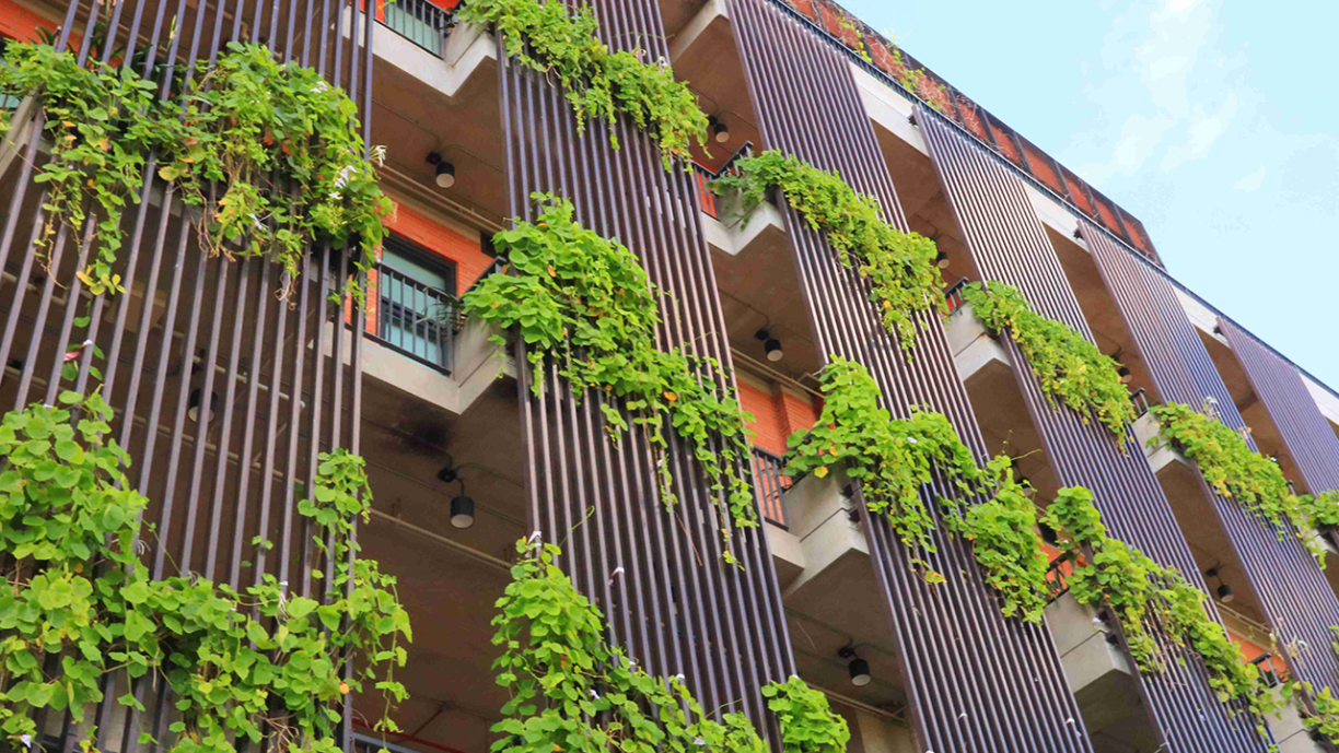 How the real estate industry is rising to the challenge of greener cities. Green Eco Building in the City, Green architecture.