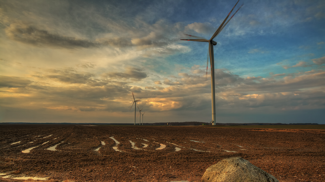 Landscape with wind farm, winter time Poland Europe, blue sky