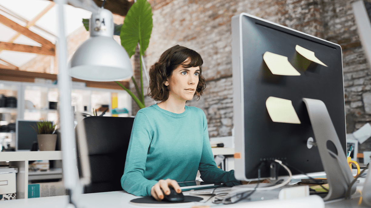 Small business, a woman working at the office.