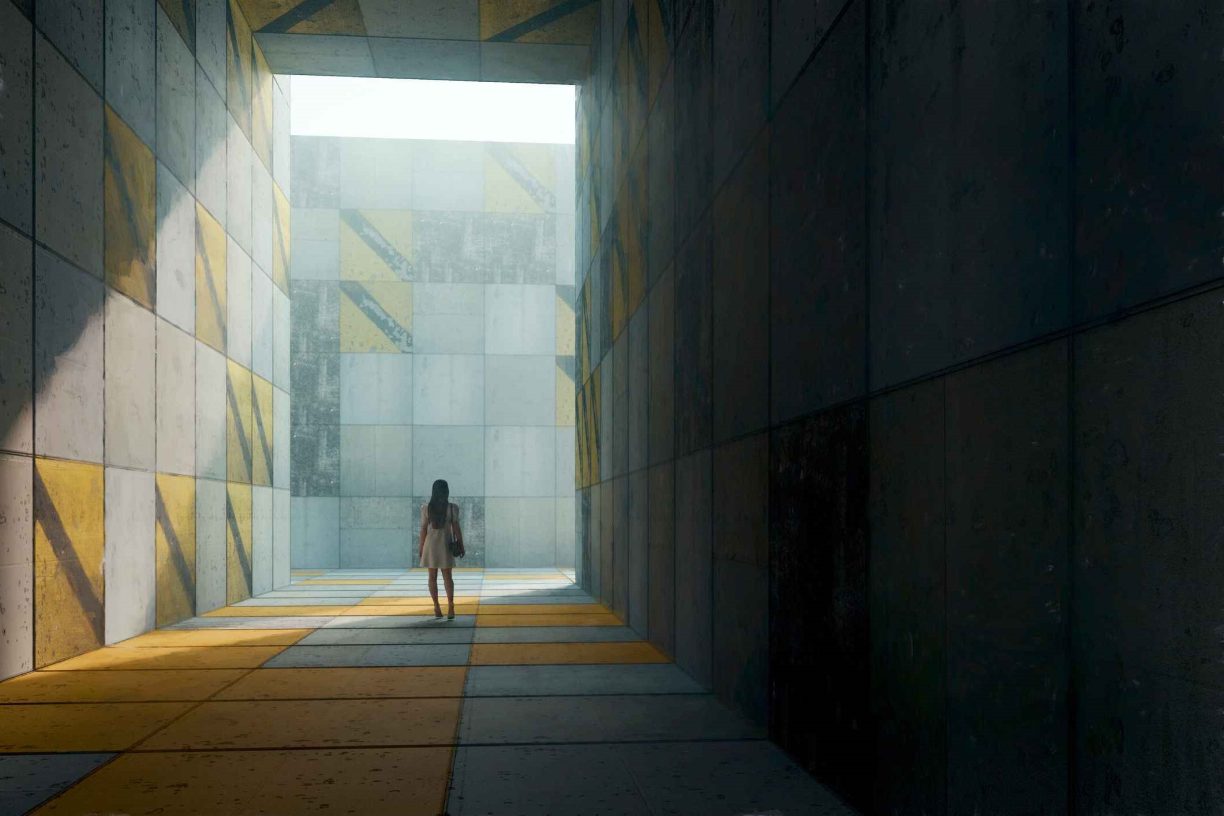 Lonely woman walking in concrete city corridor