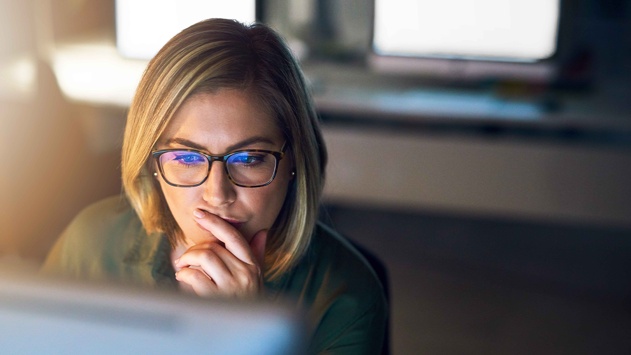 M&A and the importance of a strategic view of Purchase Price Allocation. Shot of a young businesswoman working late on a computer in an office