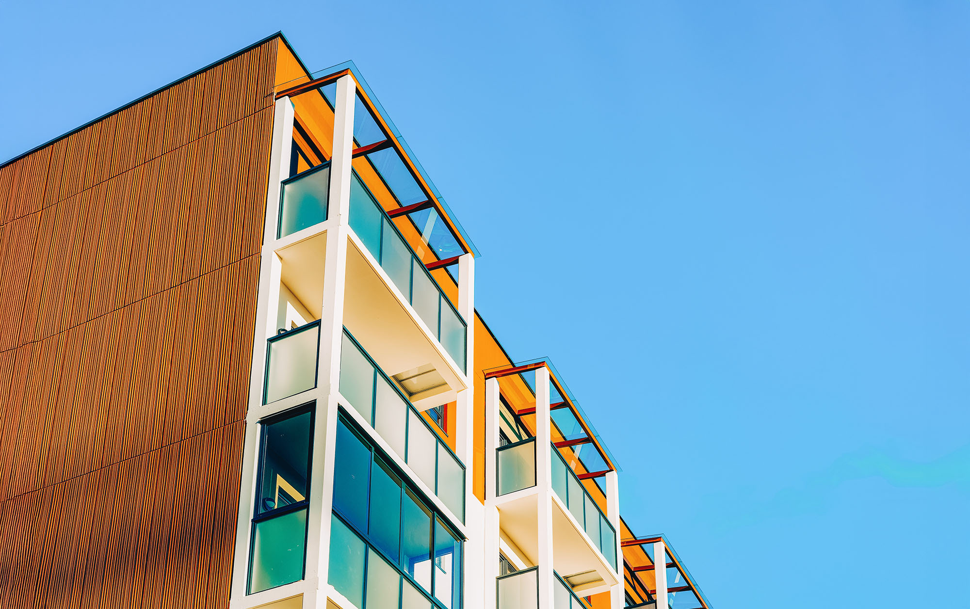 Facade of the modern apartment house with copy space