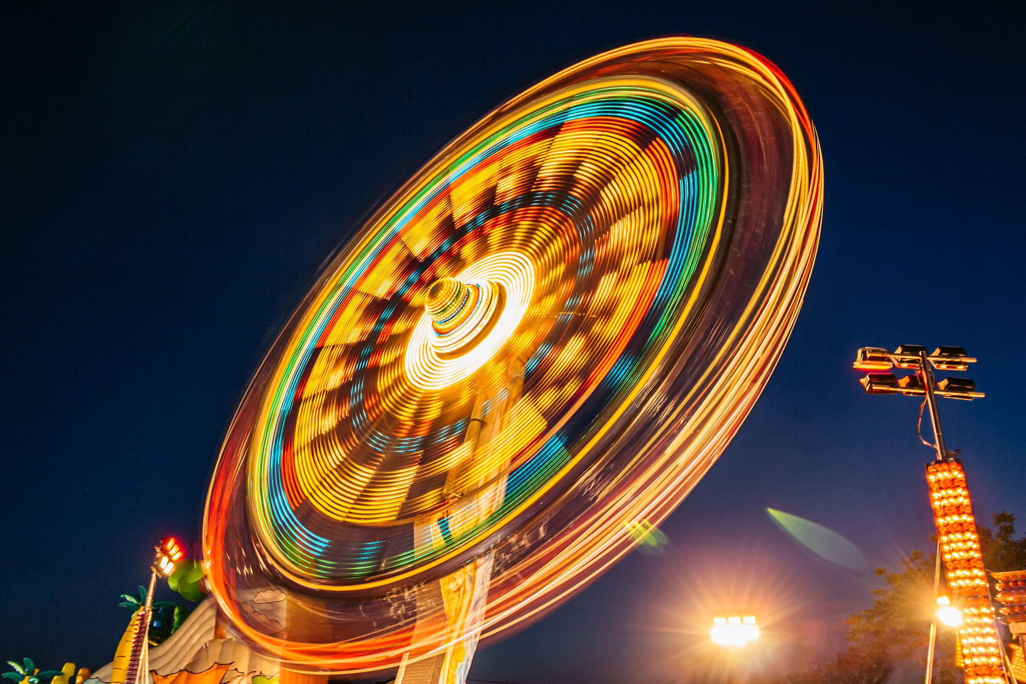 An Amusement Park Ride During The Night