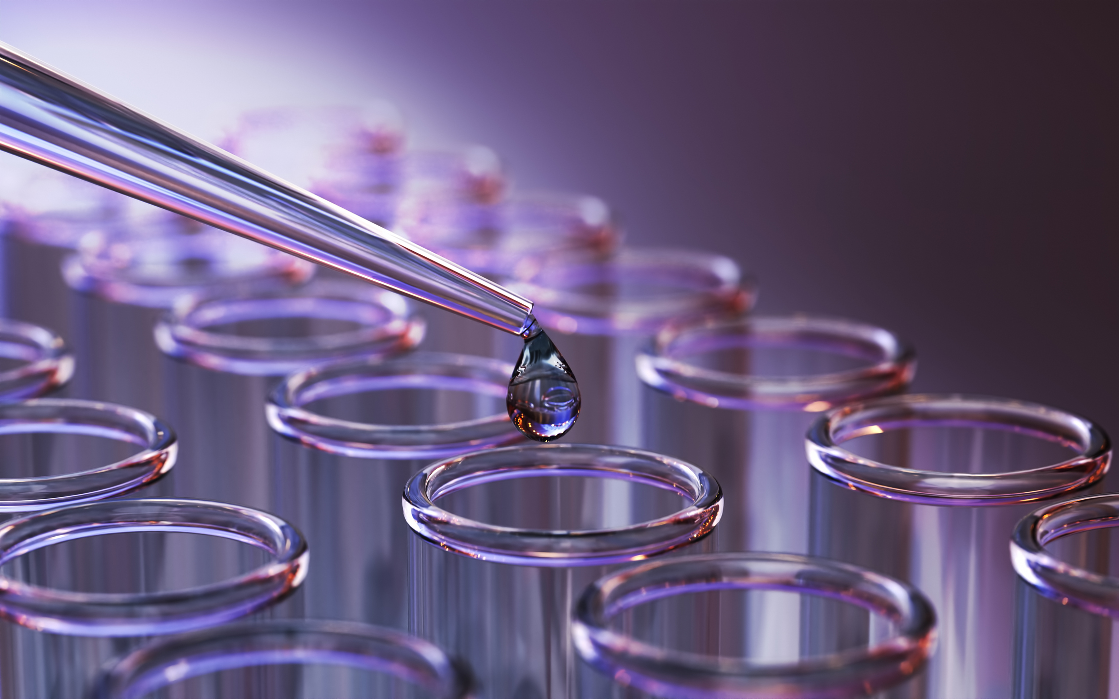 Testing Liquid from Glass Pipette to Test Tubes on Purple Reflective Background