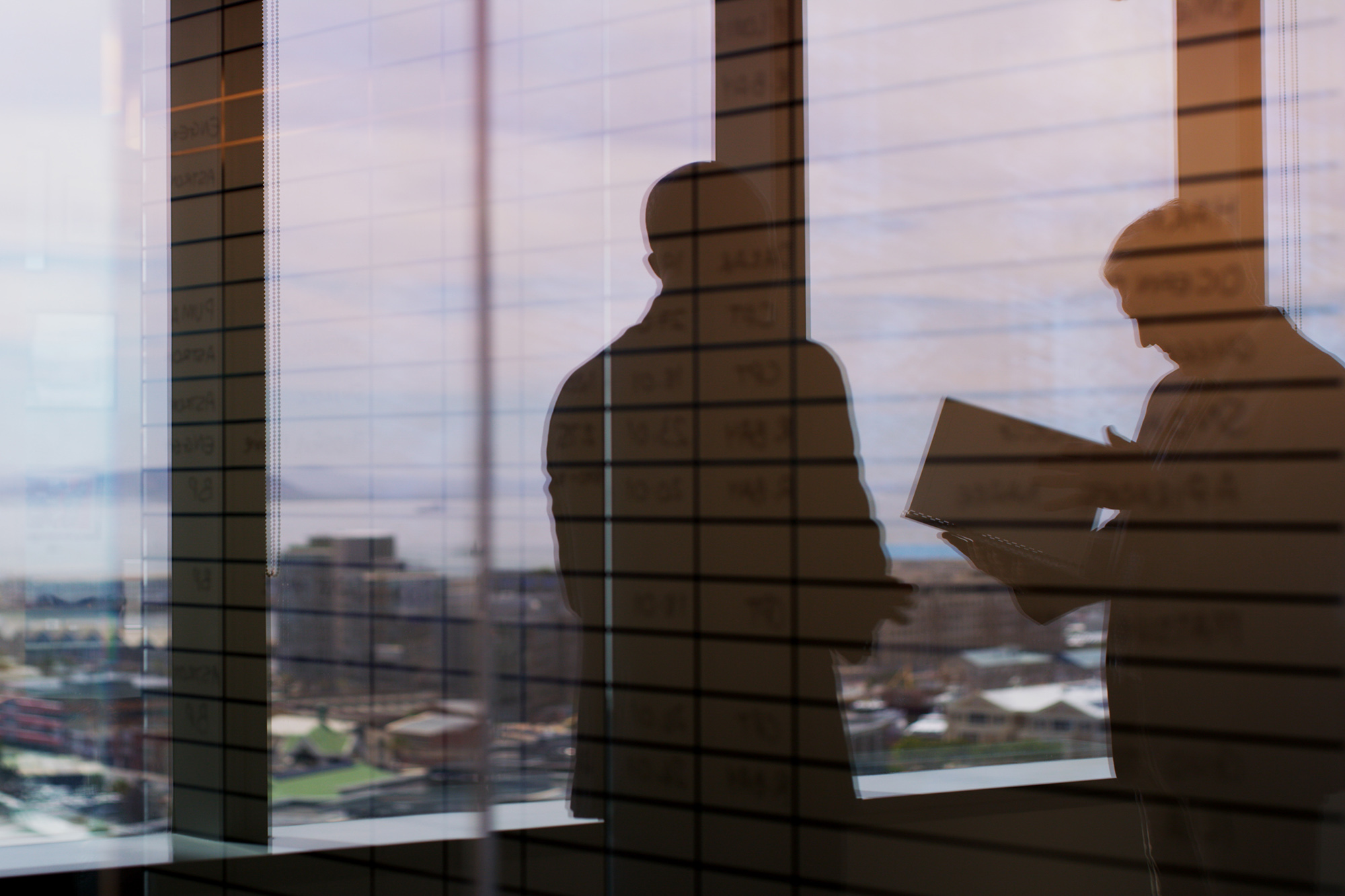 Silhouette, meeting and team with business people in office for regional plan, urban developer and b2b. Partnership, zoning code regulation and property acquisition with employees for infrastructure