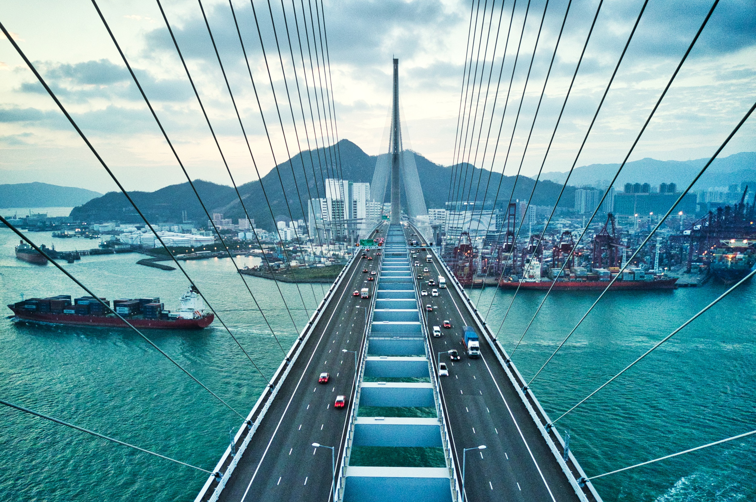 Bridge in Hong Kong and Container Cargo freight ship